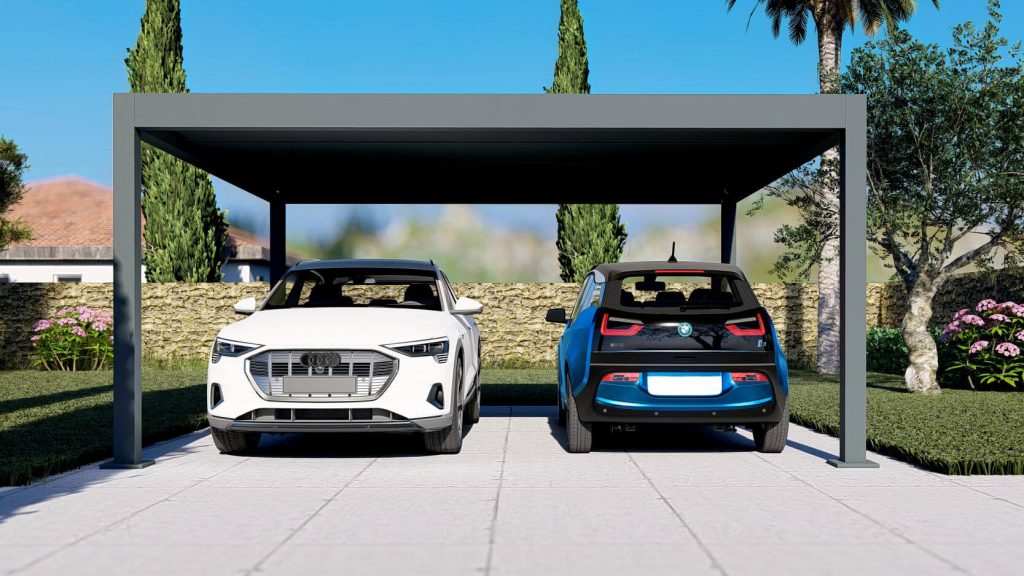 Carport double devant la maison Carport double à toit plat abritant deux voitures devant une maison, dans un jardin méditerranéen